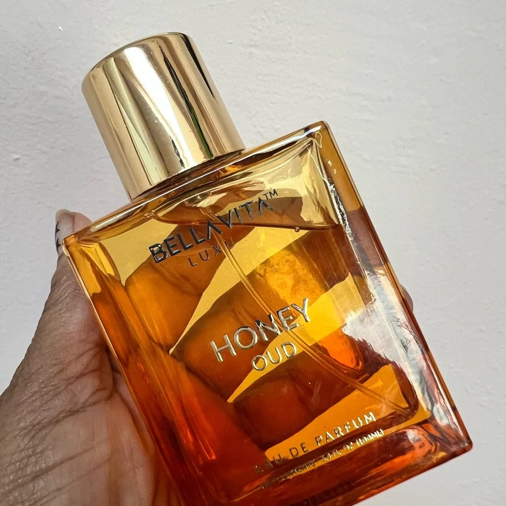 Bella Vita Honey Oud Perfume in Gold and Amber - Picture 1 of 1